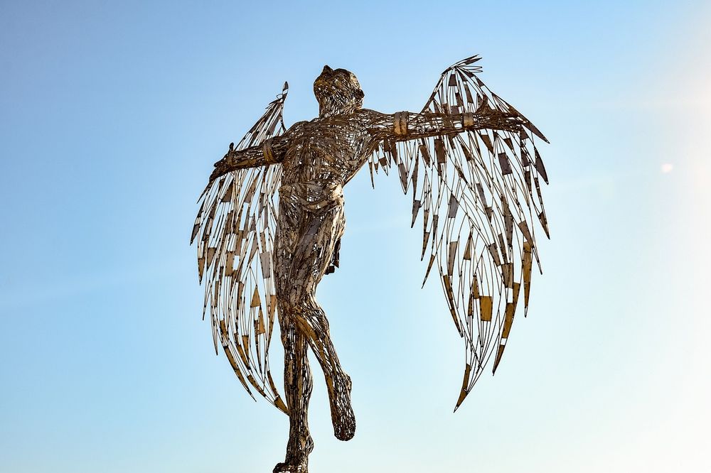 A statue of Icarus - arms spread ready to fly