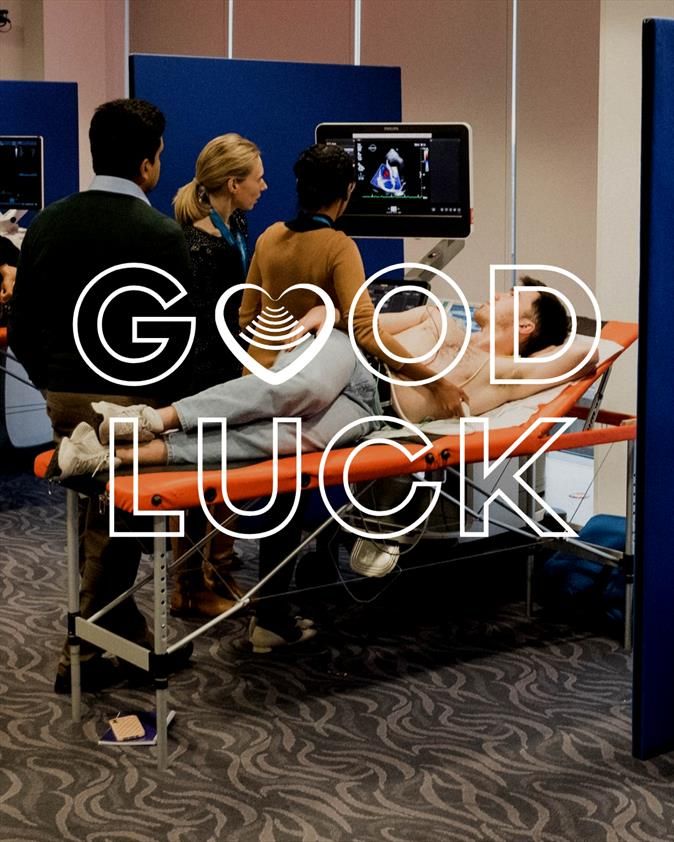 Good luck with BSE logo heart replacing the first O, superimposed over an image of a TTE scan