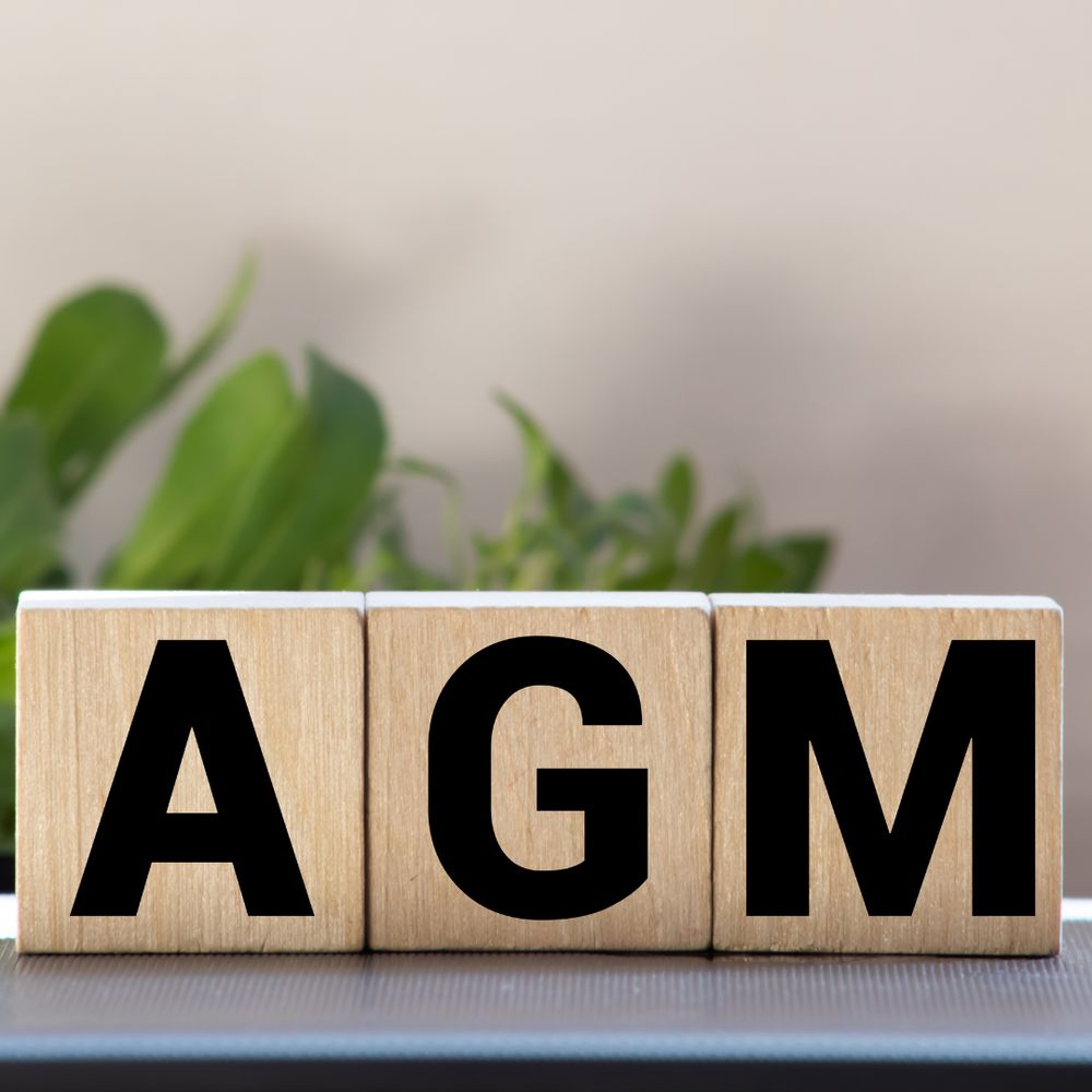 The letters AGM