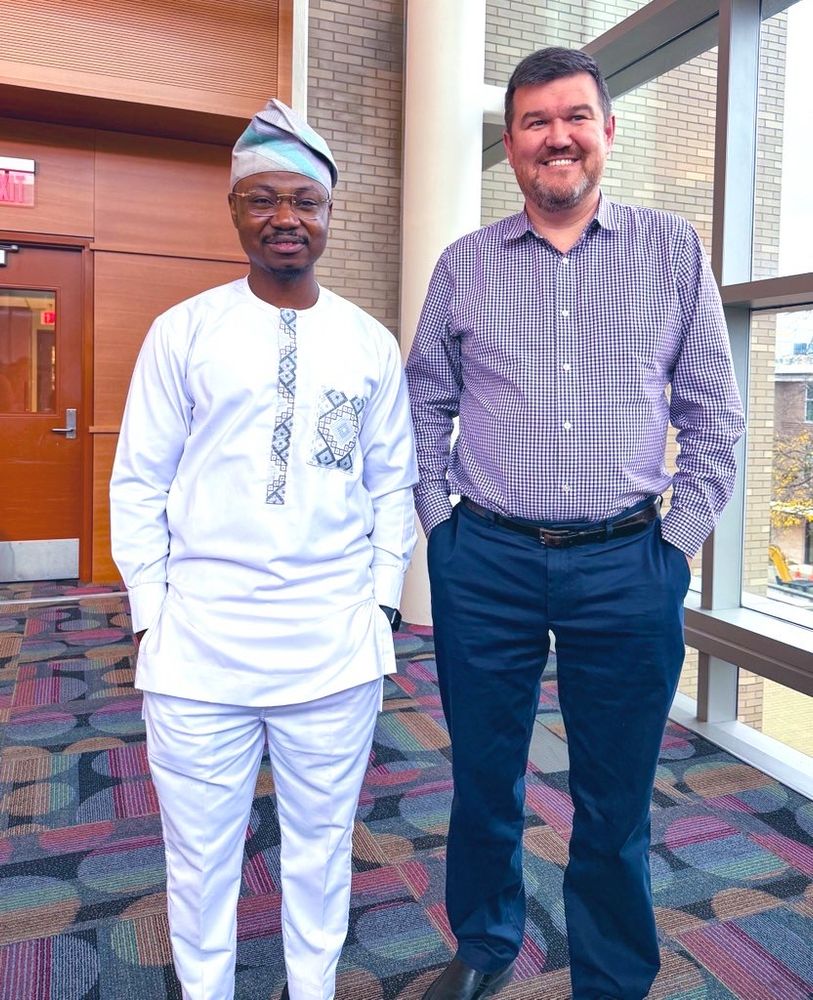 New PhD, Dr. Isaiah Adelabu with advisor, Ed Chekmenev