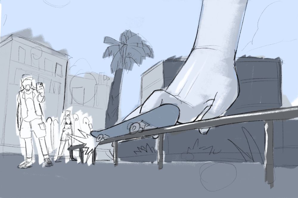 Lily’s hand fingerboarding with a full-size skateboard. Onlookers are filming as it pulls a sick grind