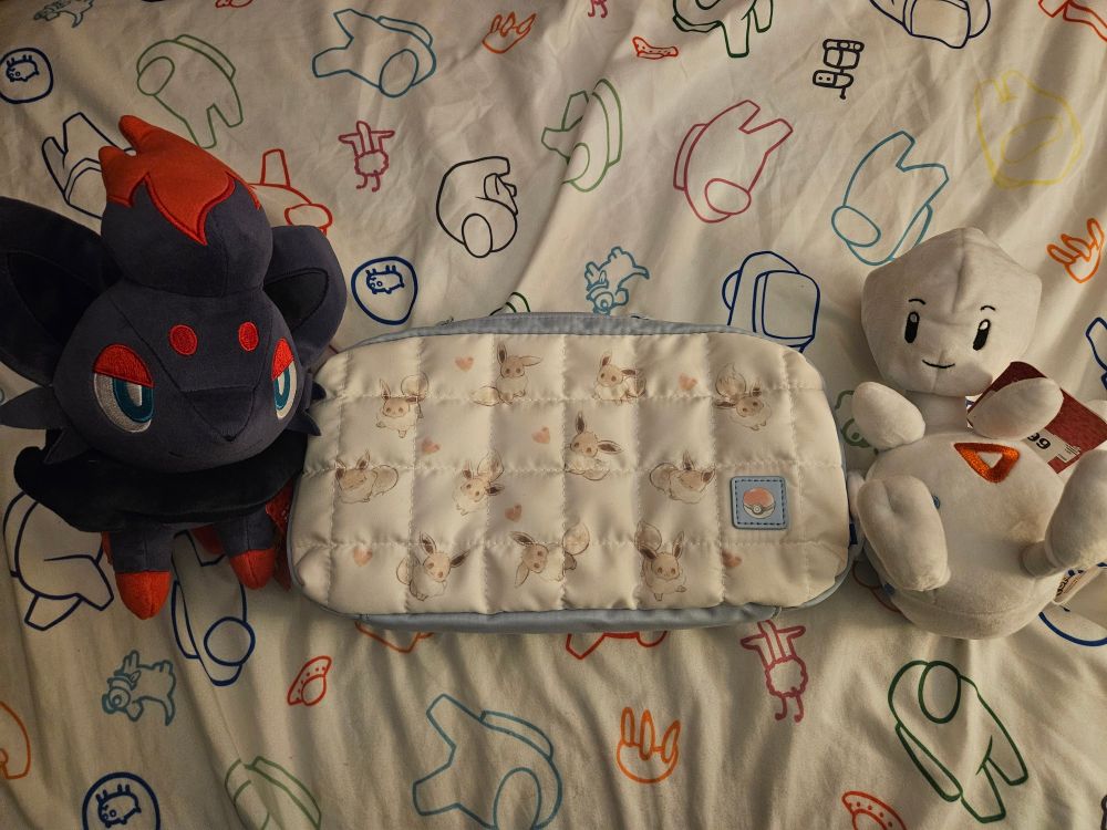 Pokemon plushies and eevee switch 2 case
