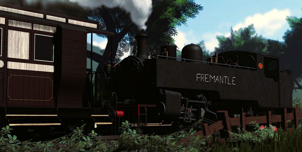 Large narrow-gauge tank engine. The name "FREMANTLE" is chalked on the side. It is reversing, pulling a carriage through the country