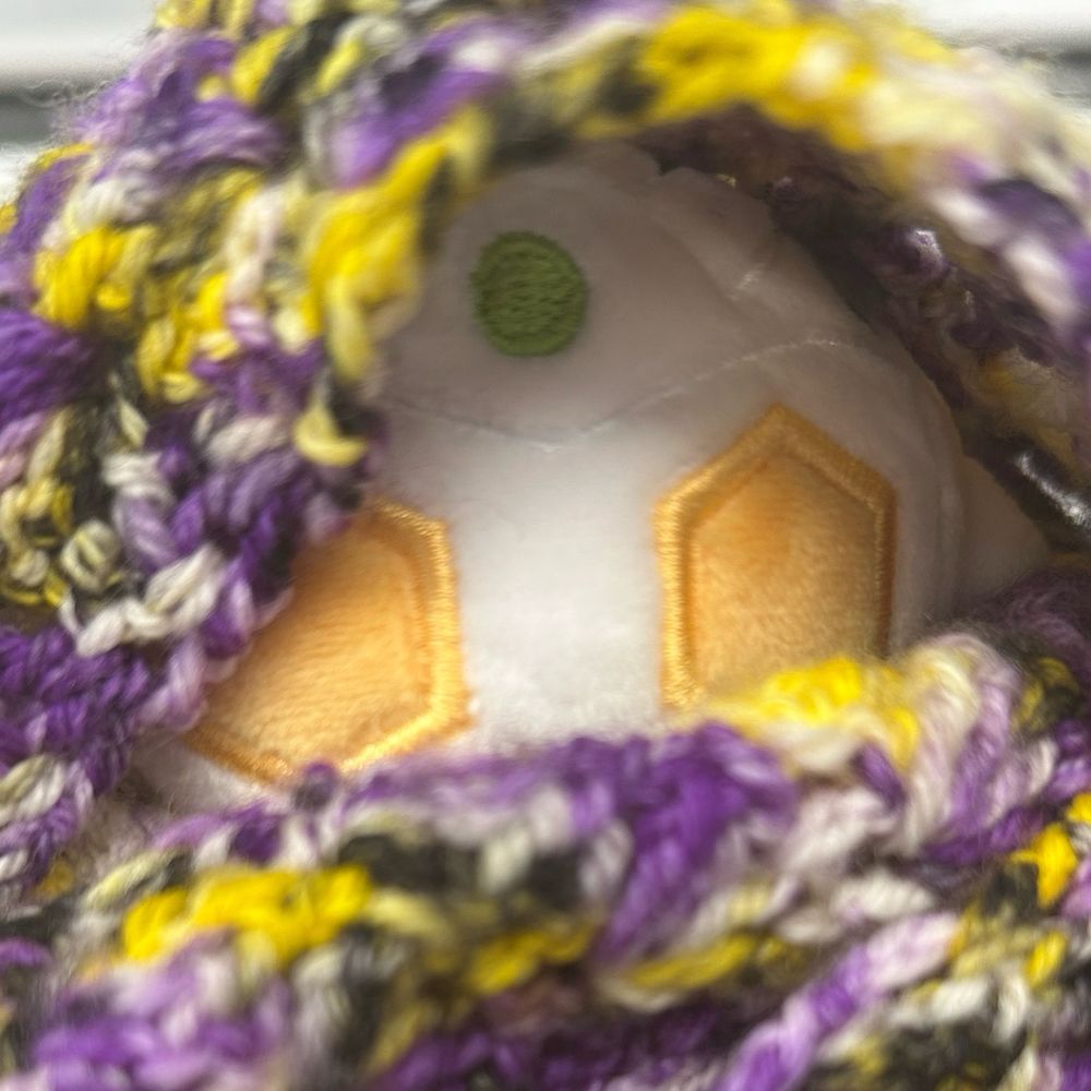 close up of seven mochi wrapped in scarf