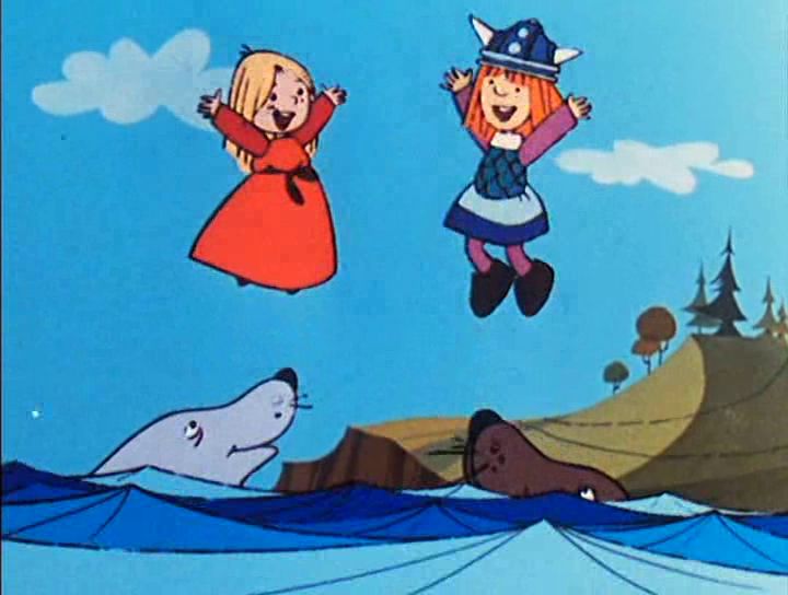 Ylvi und Wickie werden von zwei lieben Robben in die Luft geworfen. 