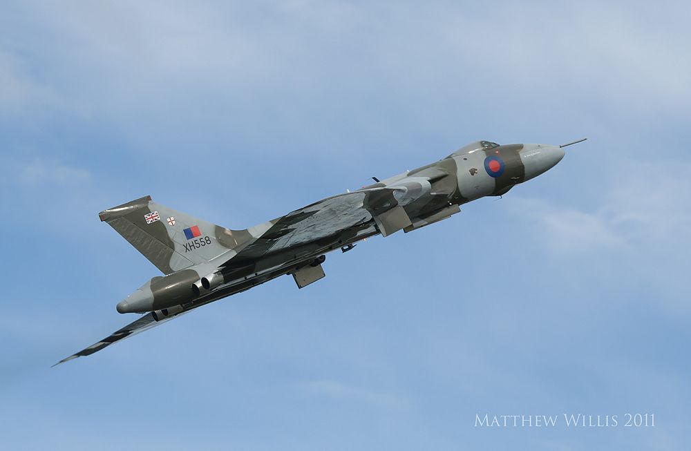Photo of Vulcan XH558 climbing steeply during a simulated aborted landing at Abingdon in 2011