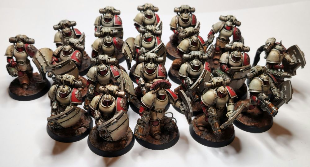 A group of 20 space marines carrying shields and volkite chargers, with 4 specials carrying graviton guns
