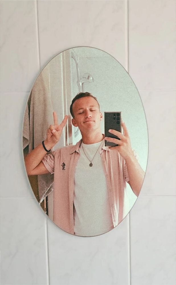 A fag in a bathroom mirror