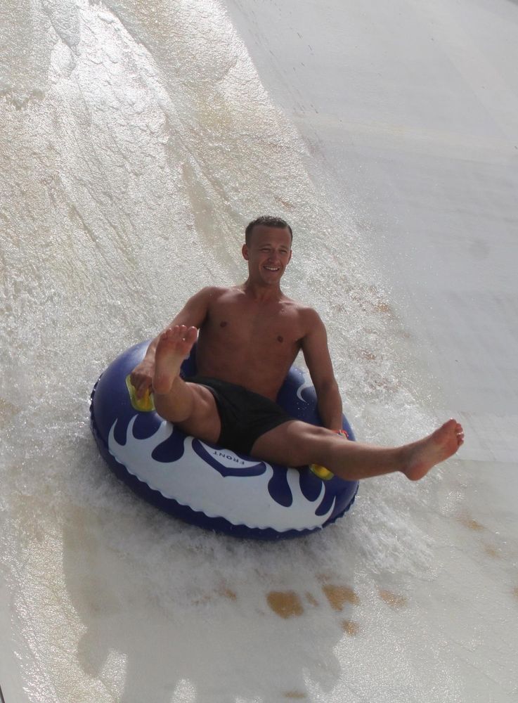 Me sat on a single rubber ring going down another slide.