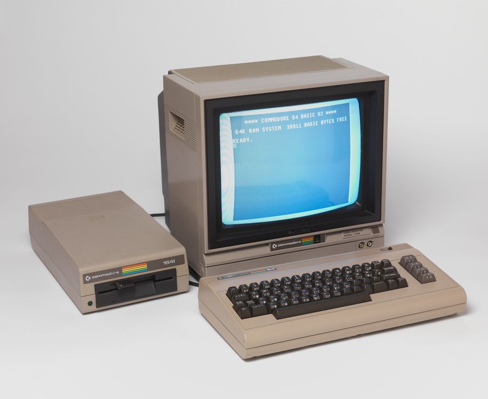 Commodore 64 computer, 1541 disk drive and CRT monitor.