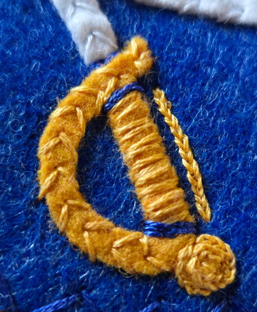 An embroidered sword handle