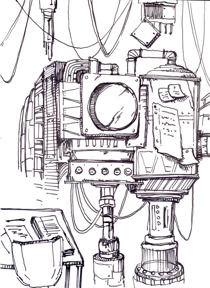 Big button with miscellaneous mechanical panels, circuits, wires, and structures nearby