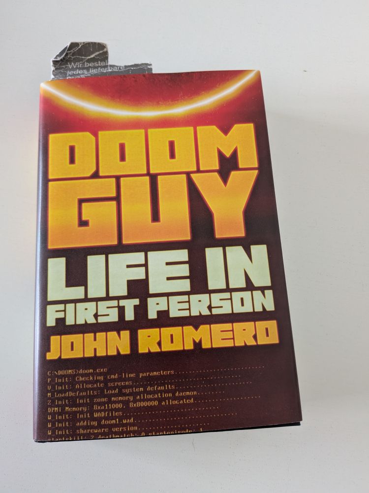 Photo of John Romero's autobiographical book: Doom Guy - Life in First Person.