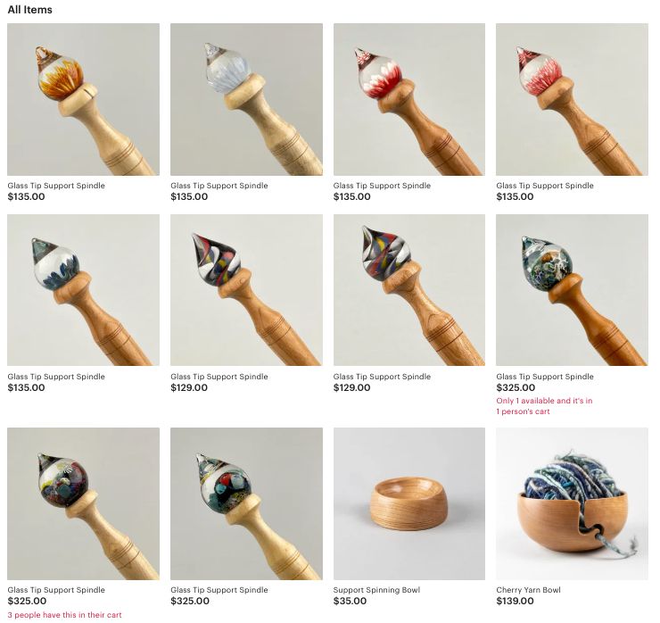 Several blown glass tipped support spindles pictured on an etsy page.