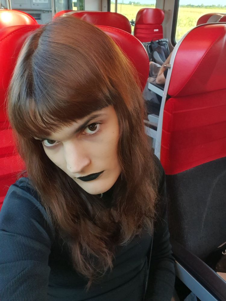 selfie of me on a train from August 2025