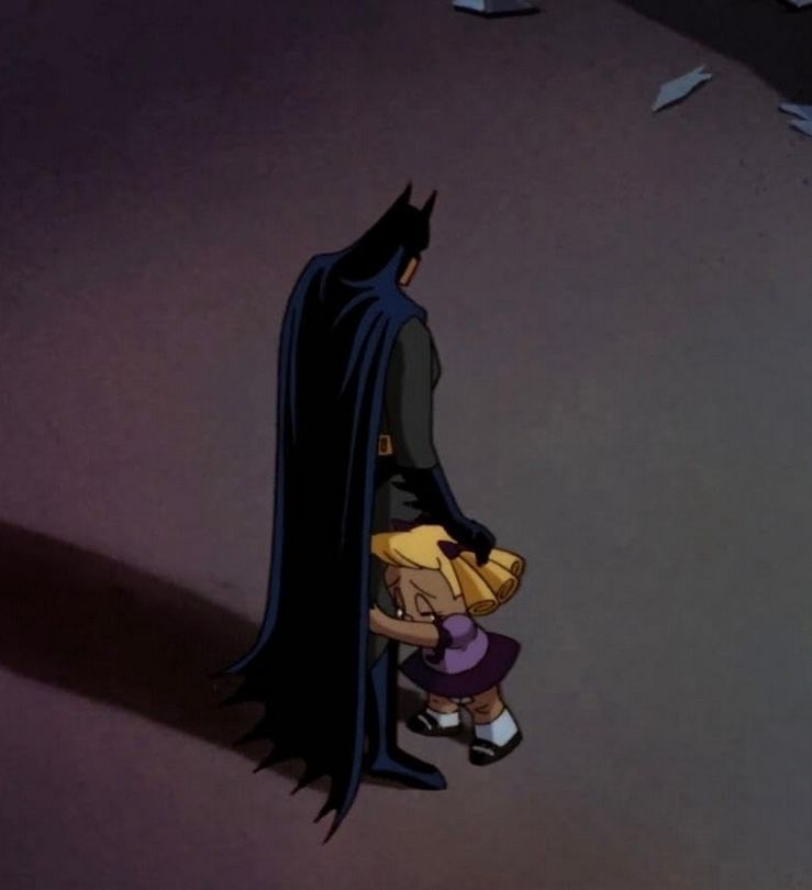 A frame from the end of a Batman: The Animated Series episode called "Baby-Doll," showing the villain, a character named Mary Louise Dahl (aka Baby Doll) who suffers from a rare medical condition that kept her from physically aging past 5, hugging Batman as he consoles her.

During the climax of the episode, Baby Doll runs into a fun house house of mirrors, where she sees a mirror that distorts her reflection that shows her what she would look like as a 30 year old woman, if she didn't have the medical condition that kept her from aging. She unloads her gun into the mirror, still trying to shoot the shards even when the gun runs out of ammo. Batman appears and gently takes the gun from her before she hugs him