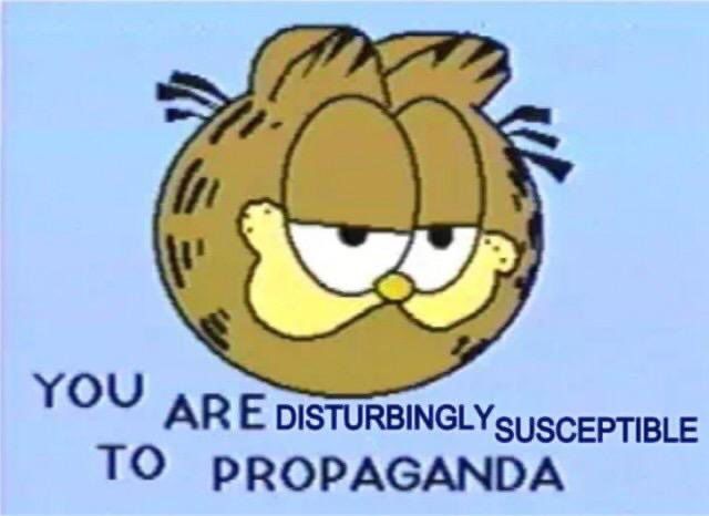 A picture of Garfield's head with the caption "you are disturbingly susceptible to propaganda"