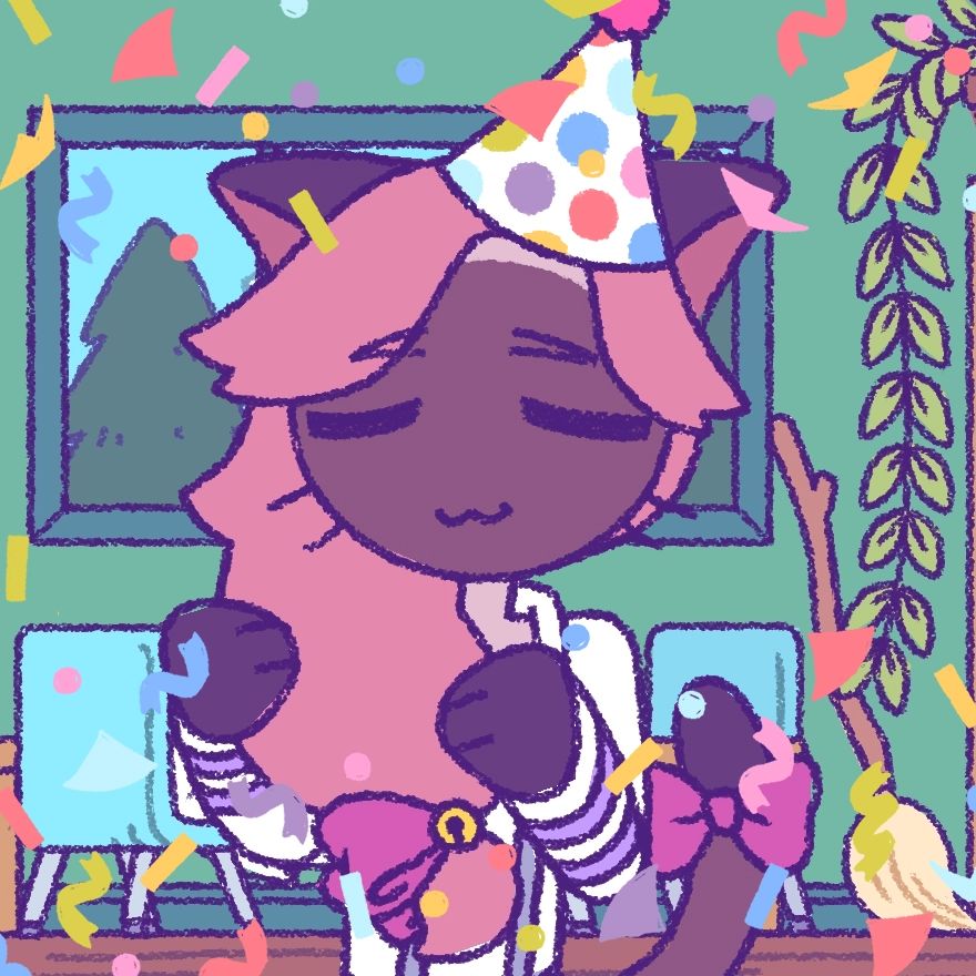 Mittens in a party hat surrounded by confetti!