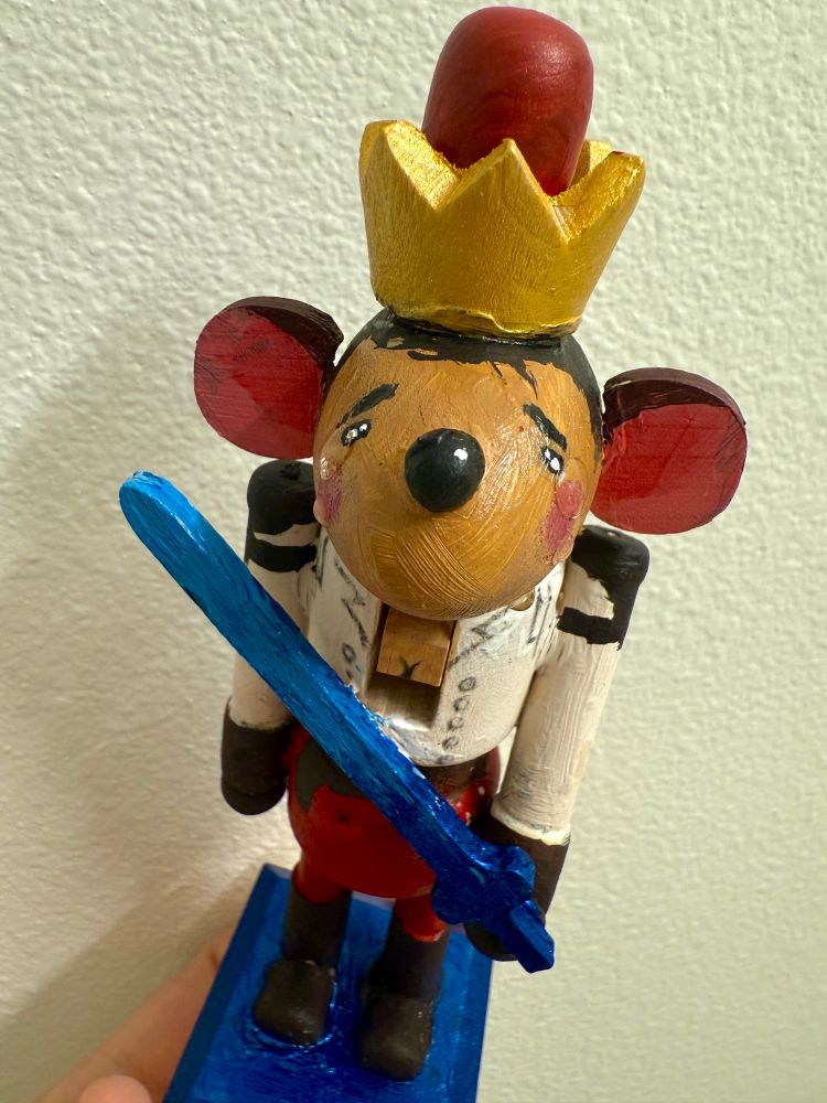 Nutcracker Jayce now with large tears made with crafting gloss, two on his right eye and three on his left, dripping down his chin