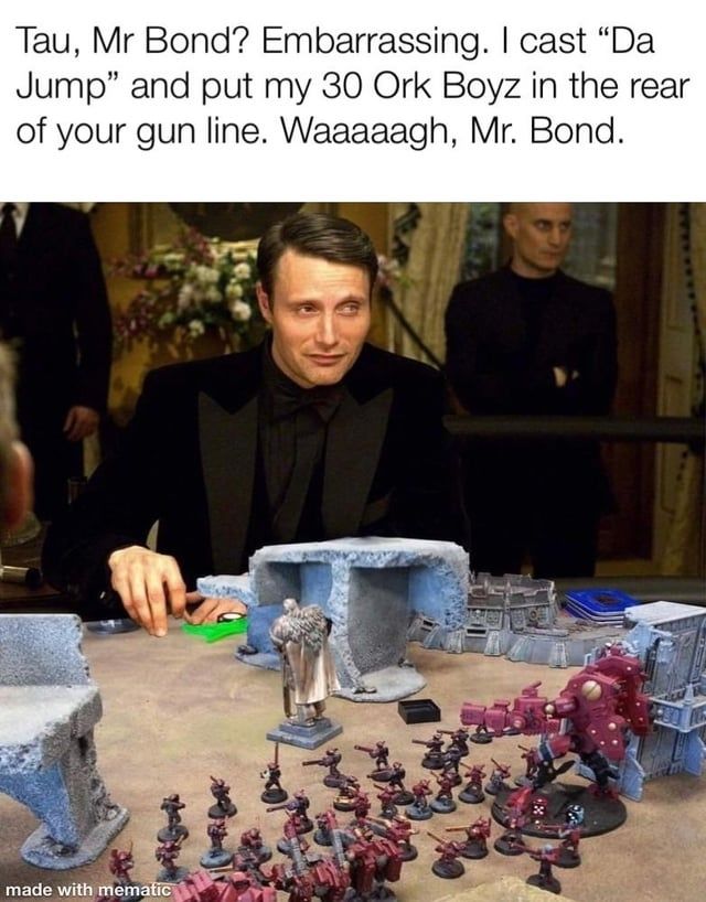 An image of Le Chiffre playing tabletop WH40k. The caption reads, "Tau, Mr. Bond? Embarrassing. I cast "Da Jump" and put my 30 Ork Boyz in the rear of your gun line. Waaaaagh, Mr. Bond.