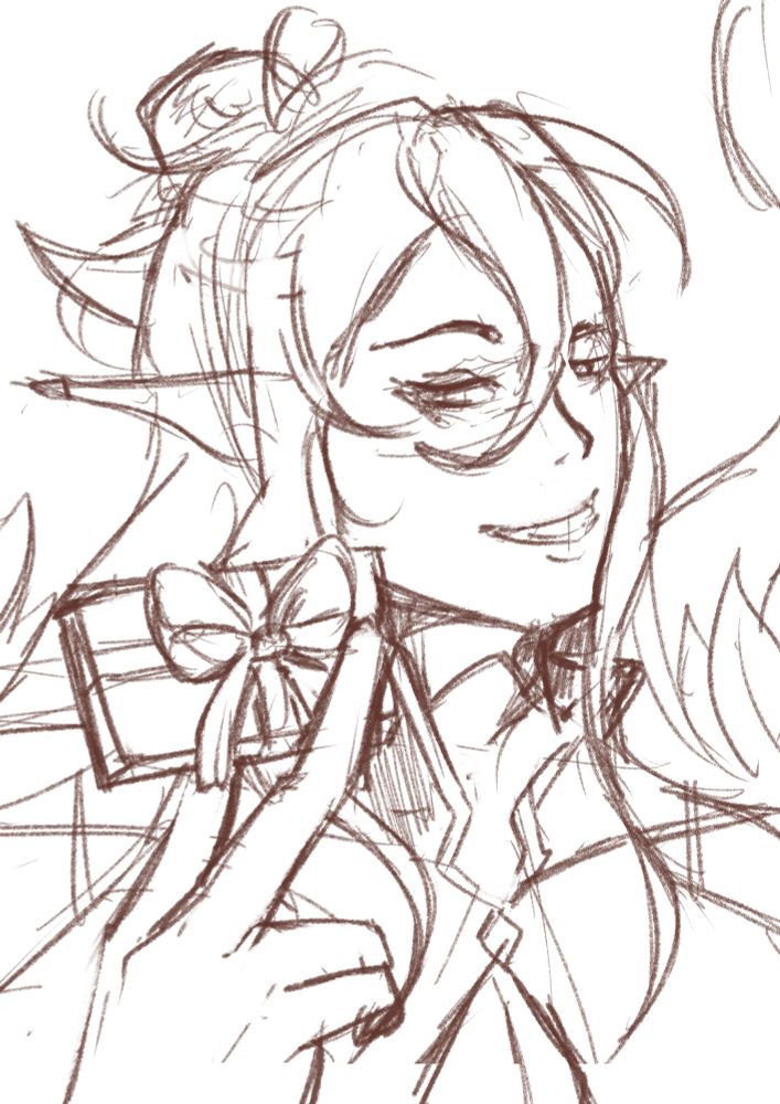 Masc. Sylla holding a box of chocolates while playfully smirking