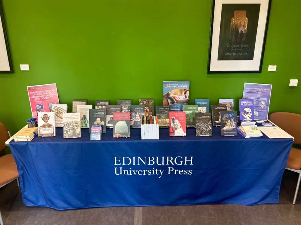 Stand covered in books 