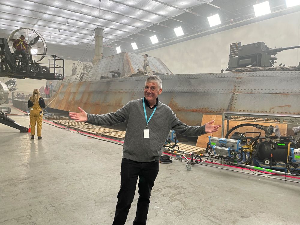 Rick standing in front of the ironclad on the sound stage.