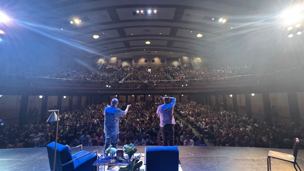 Mark and Rick at the RJ Reynolds auditorium with a full crowd.