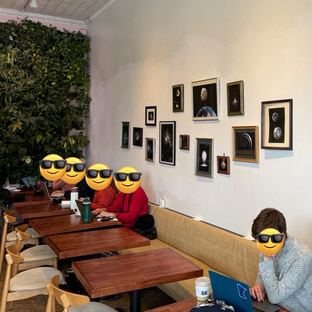 Images on the wall at SK Coffee that look like satellite photos of the universe (but are actually household oils in a jar)