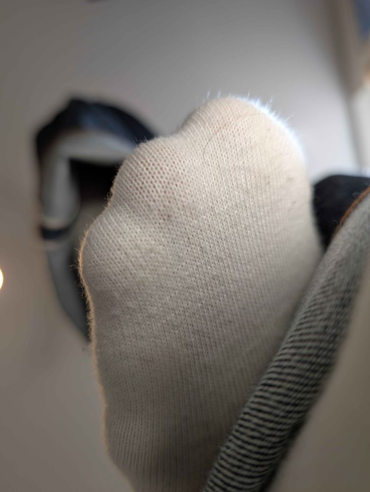 Another shot of my socked foot scratching my ankle.