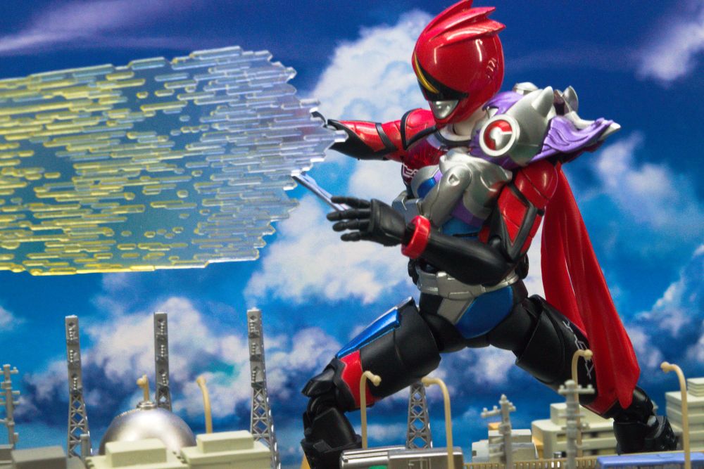 Akiba-red blocks the space beam with his MMZ-02 Munyu Munyu Zubaan.