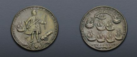 Brass medal (38mm). Obv.: Admiral Vernon standing slightly right, holding baton and sword; behind, canon to right; in background, ship under sail right; scallop and floral spray below. Legend: THE · BRITISH · GLORY · REVIV · D · BY · ADMIRAL VERNON · / Rev.: three ships under sail right and three ships within harbour of Portobello; in the exergue, NOV · 22 · 1739 above floral design. Legend: WHO · TOOK · PORTO · BELLO · WITH · SIX · SHIPS · ONLY · Brown surfaces, minor flan cracks, a few light scratches. Condition: VF.