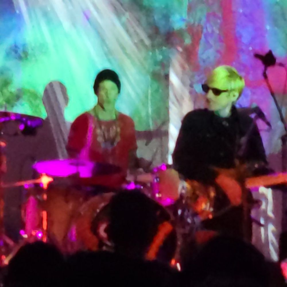 The band kula shaker on stage. 