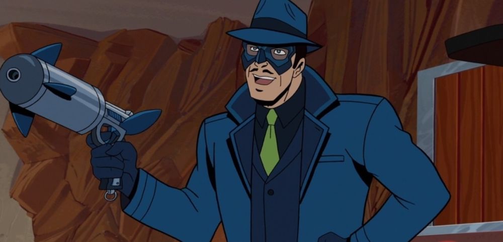 Animation cell from the Venture Brothers Cartoon showing an image of the character,  The Blue Morpho. A green hornet expy character with a blue butterfly motif.