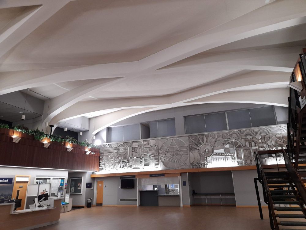 Interior of building with wide angle view of the Mitchell mural