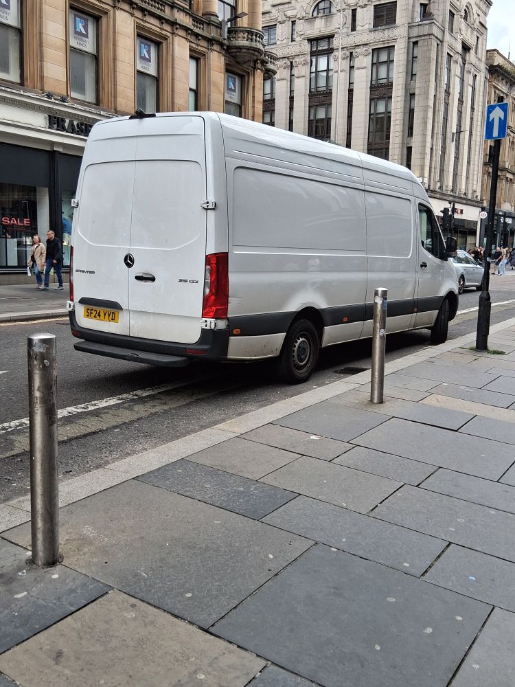 White van parked in bike lane