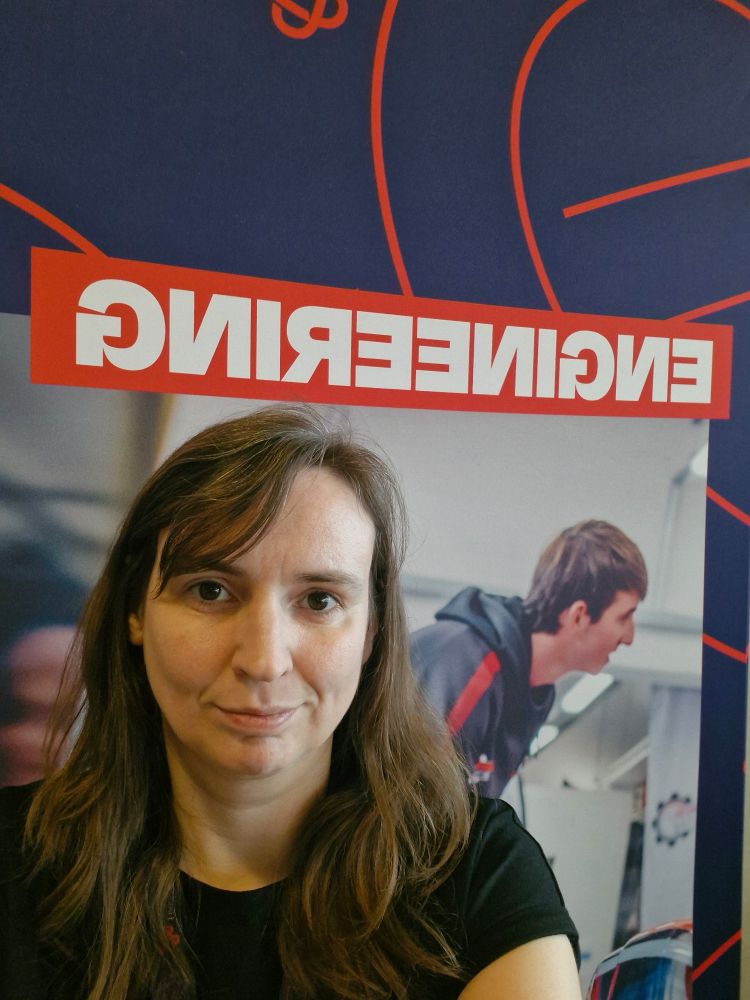 Myself standing in front of our Engineering stand sign