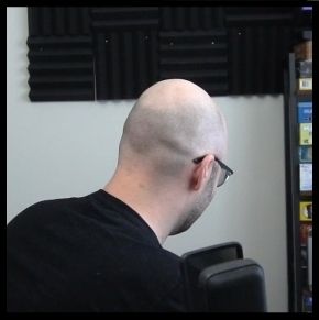 Picture of Northerlion from behind. Idk what else you expected me to say. He's also wearing a black t-shirt if that helps.