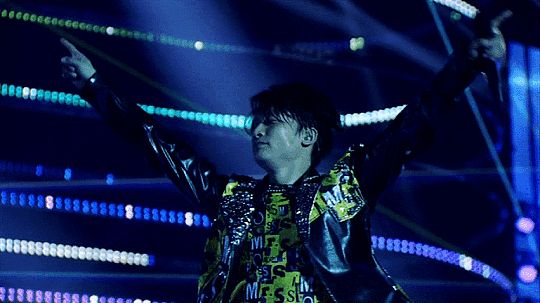 Animated GIF of Katori Shingo vibing to the music and laser lights during the Mr. S concert
