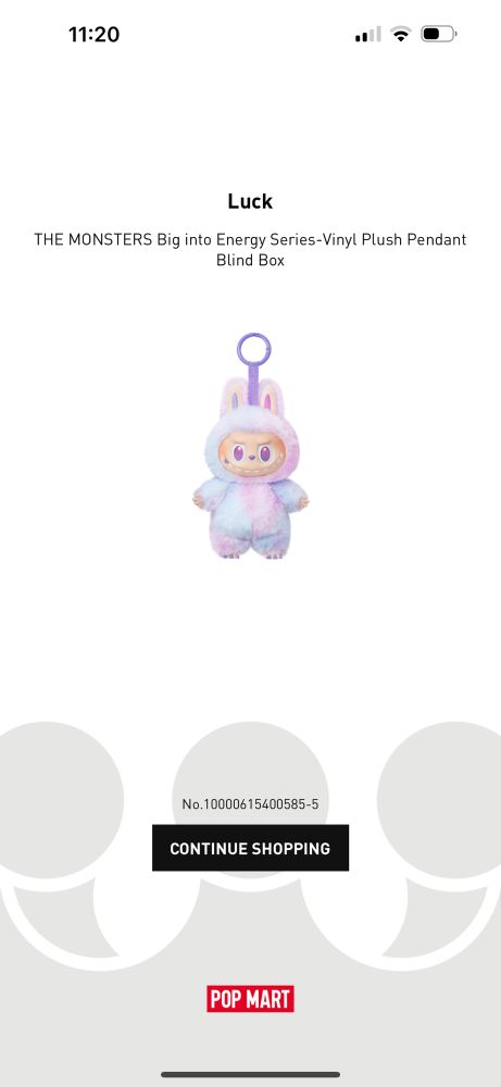 Big Into energy labubu luck. She is a purple tie-dye bunny like elf monster.