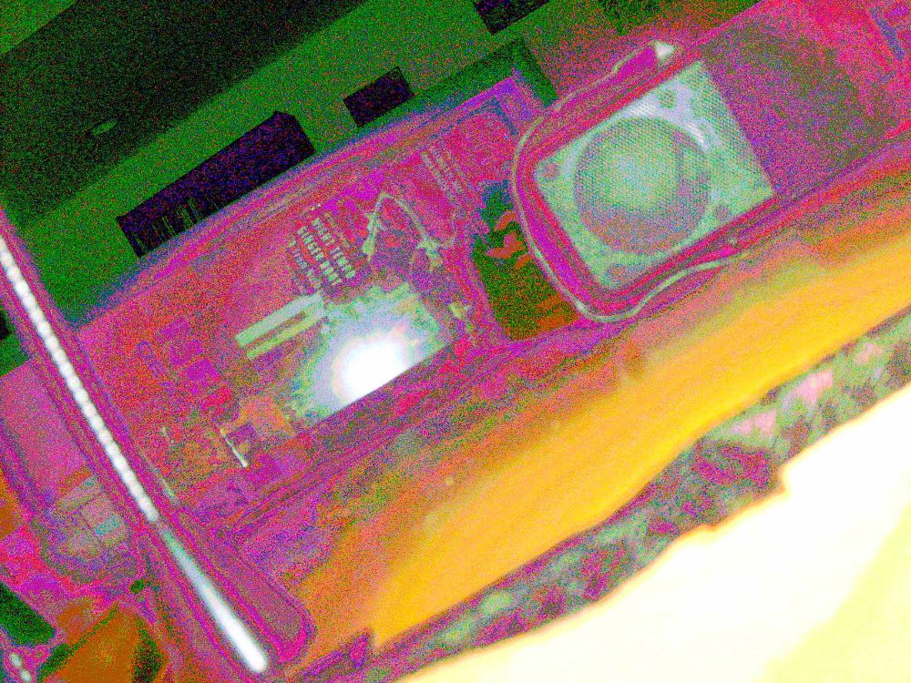 Basically the same image as the above but the mid range is absolutely roached out with magenta, the shadows are matrix green but have depth to them, and there's banding in the highlights