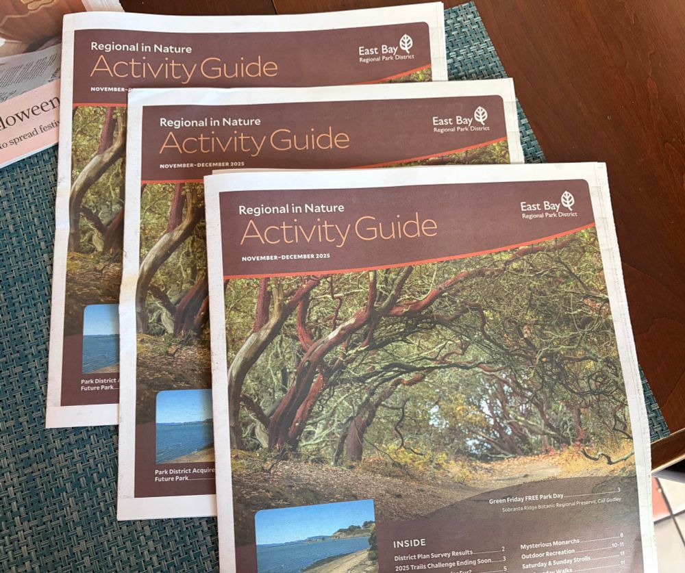 A stack of three Activity Guides for November-December 2025 from the East Bay Regional Park District, all delivered to my house in the last four days. 