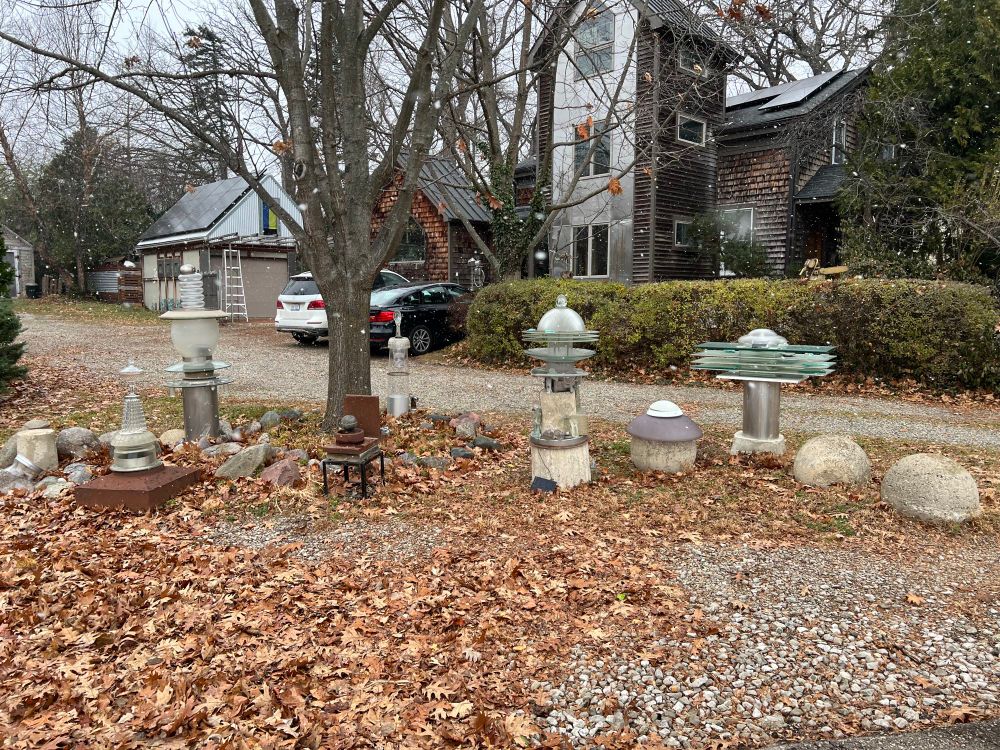 The glass art beside the train tracks that tells you where you are in this lower town neighborhood of Ann Arbor. 