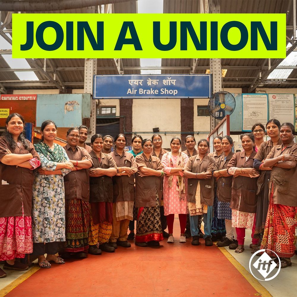 Image of Indian rail workers standing together
