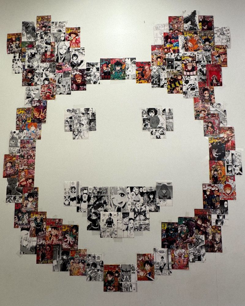 A wall mural made out of manga panels