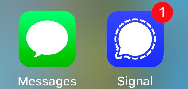 A partial iPhone screenshot shows the Apple Messages app icon free of notifications beside the Signal encrypted open-source messaging app icon carrying a notification badge that signals a message waiting to be read by the user — ostensibly stating that user’s timely preference for communications privacy and safety. 