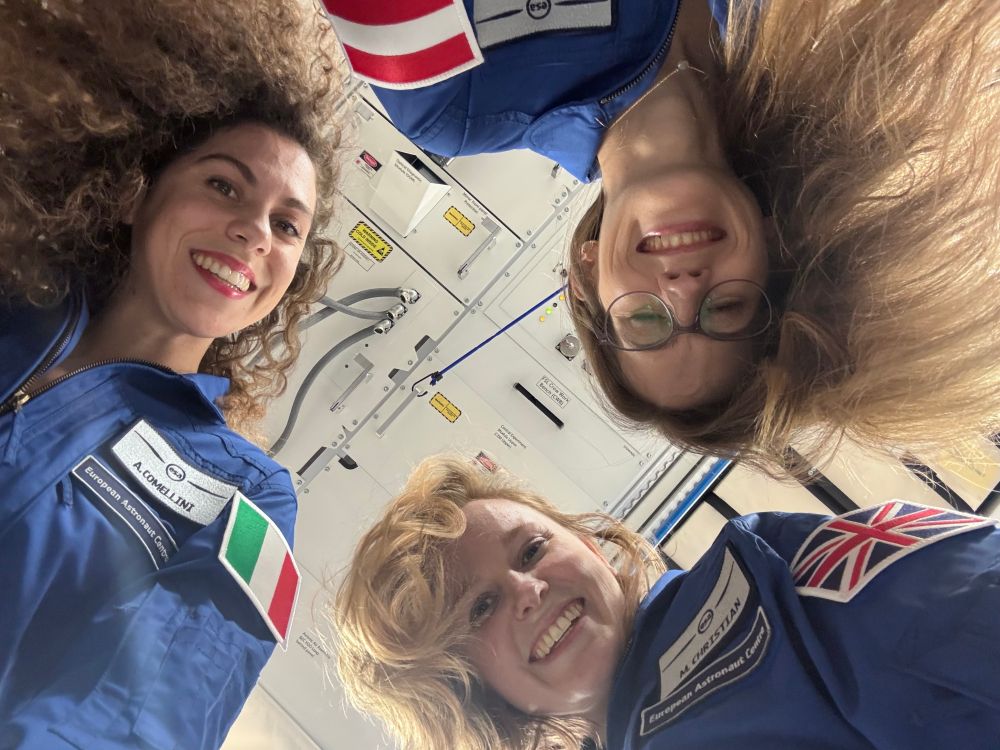 Picture of Meganne Christian, Anthea Comellini and Carmen Possnig inside a mockup of the Columbus module at the European Astronaut Centre in Cologne, Germany. 