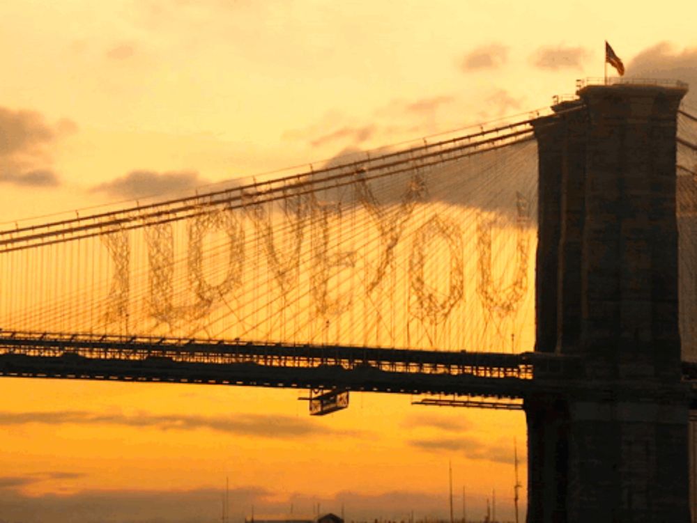 a bridge has the word love you written on it