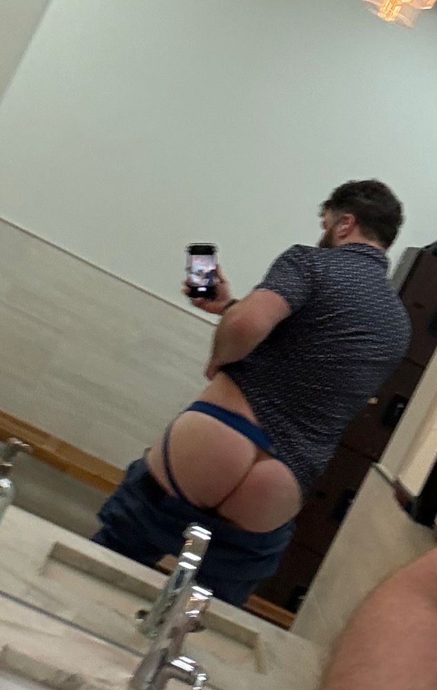 A blurry picture of my ass in the gym mirror