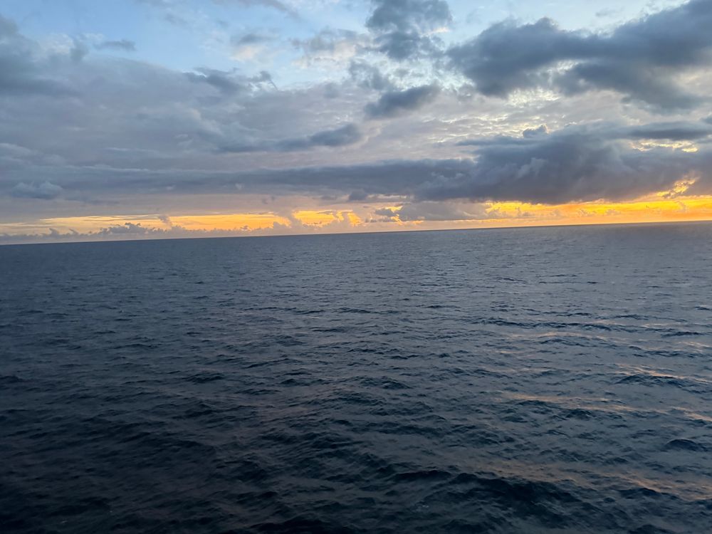 Some clouds over the ocean at sunset